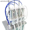 Four Heads Vacuum Liquid Perfume Filling Machine